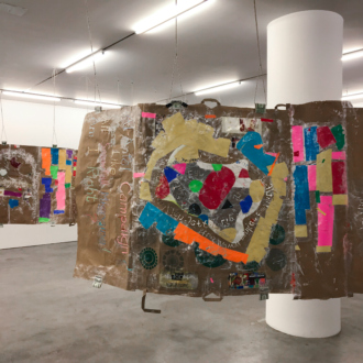 Installation view. <i>Modern Untitled Tragic Timeline</i>, 2019. Collage: acrylic paint, cash, grocery bags on paper, acrylic tubes and twine. 45 x 720 in./ 114.3 x 1828.8 cm.