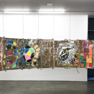 Installation view. <i>Modern Untitled Tragic Timeline</i>, 2019. Collage: acrylic paint, cash, grocery bags on paper, acrylic tubes and twine. 45 x 720 in./ 114.3 x 1828.8 cm.