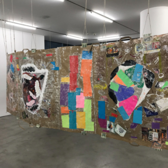 Installation view. <i>Modern Untitled Tragic Timeline</i>, 2019. Collage: acrylic paint, cash, grocery bags on paper, acrylic tubes and twine. 45 x 720 in./ 114.3 x 1828.8 cm.
