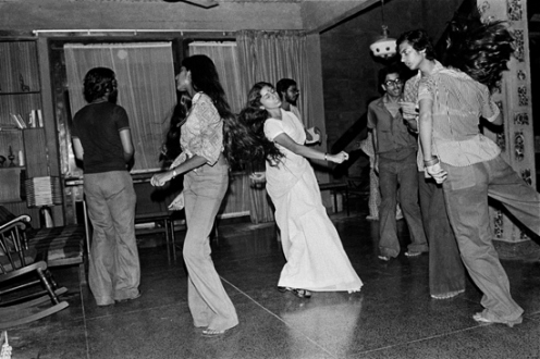 Pablo Bartholomew – Outside In - Nommie Dancing at a Party at Koko's, New Delhi, 1975. Gelatin silver print, edition of 10 (+3 AP), 16 x 24 in.