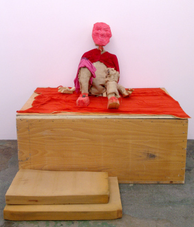 Roza-El-Hassan - Red Man, 2006. Wood, fabric and mixed media, 33 x 34 x 43 in. (installation view)